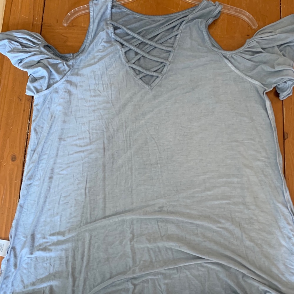 Francesca’s blue tunic